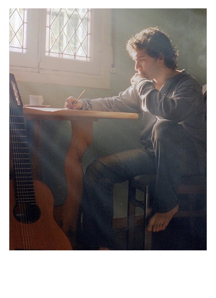 German Herlein studying and composing